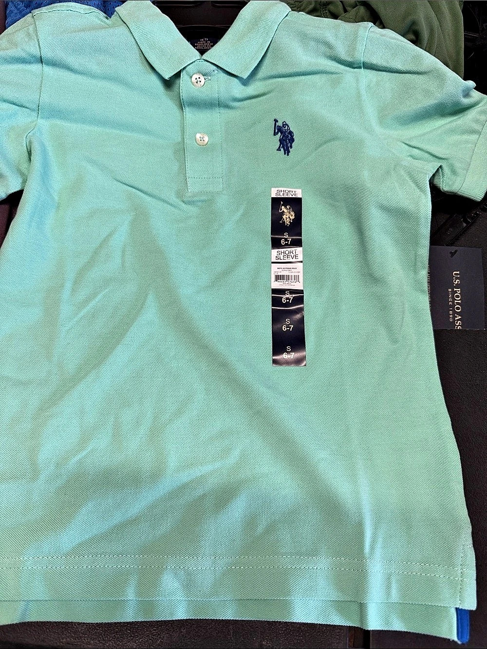 U.S. Polo Assn. Boys Short Sleeve Solid Pique Polo Shirt. Boys Short Sleeve
